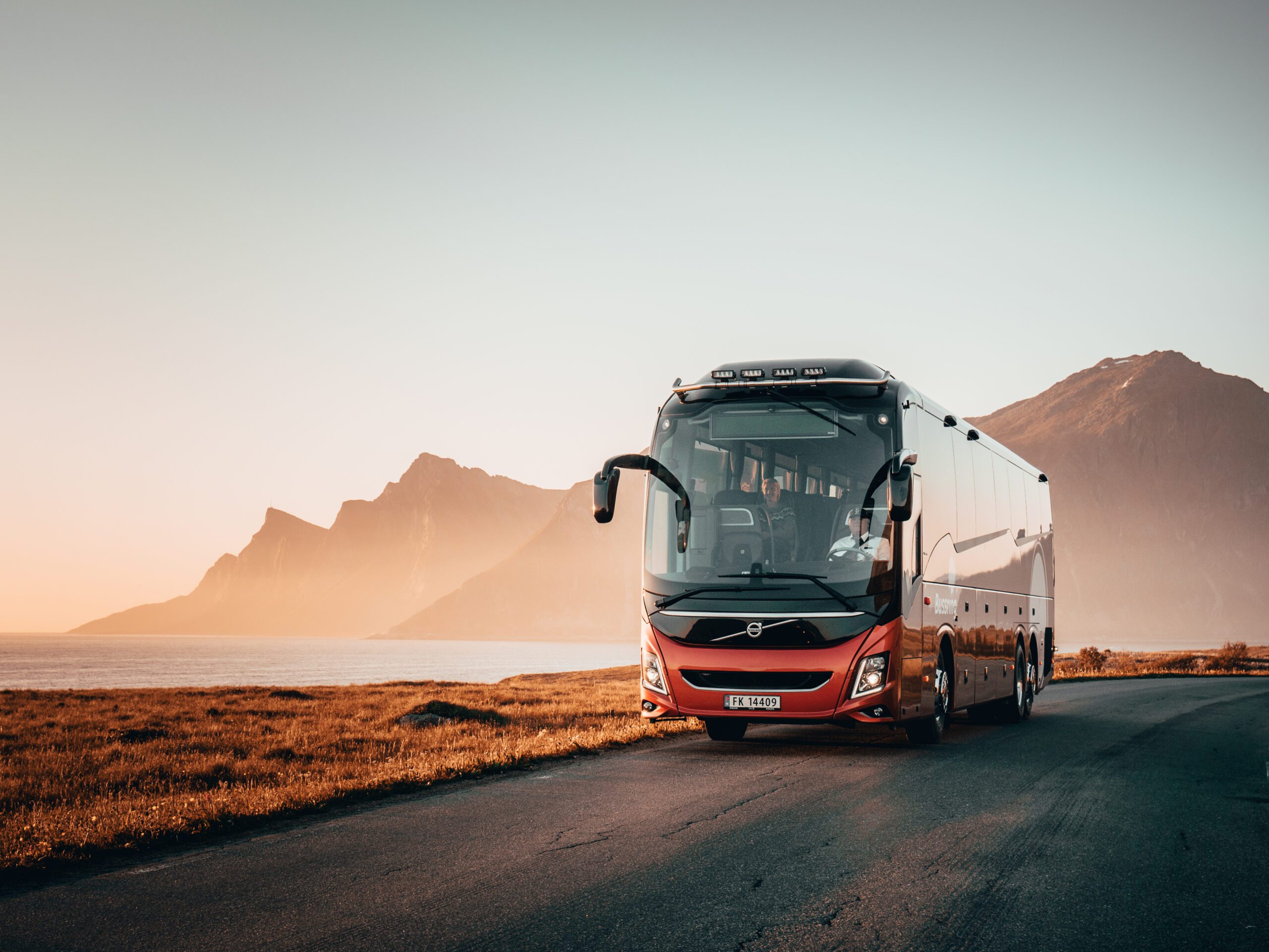 Bus driving with on a Lofoten landscape