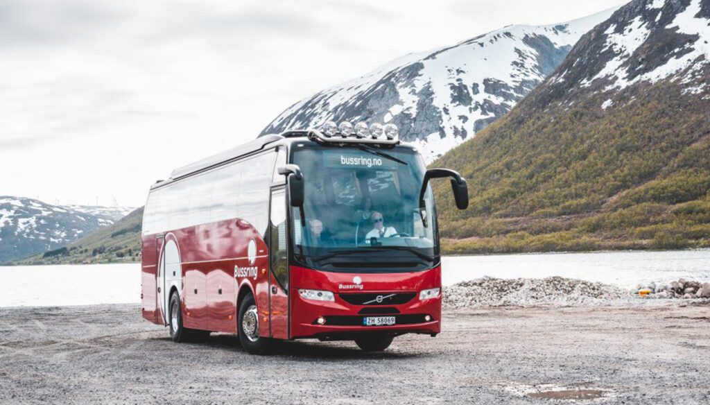 Bussring bus in front of North Norwegian landscape