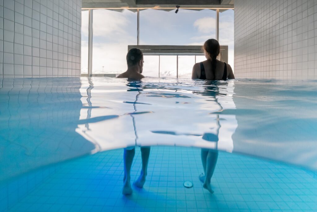 two people in the pool in Tromsø Badet in Tromsø