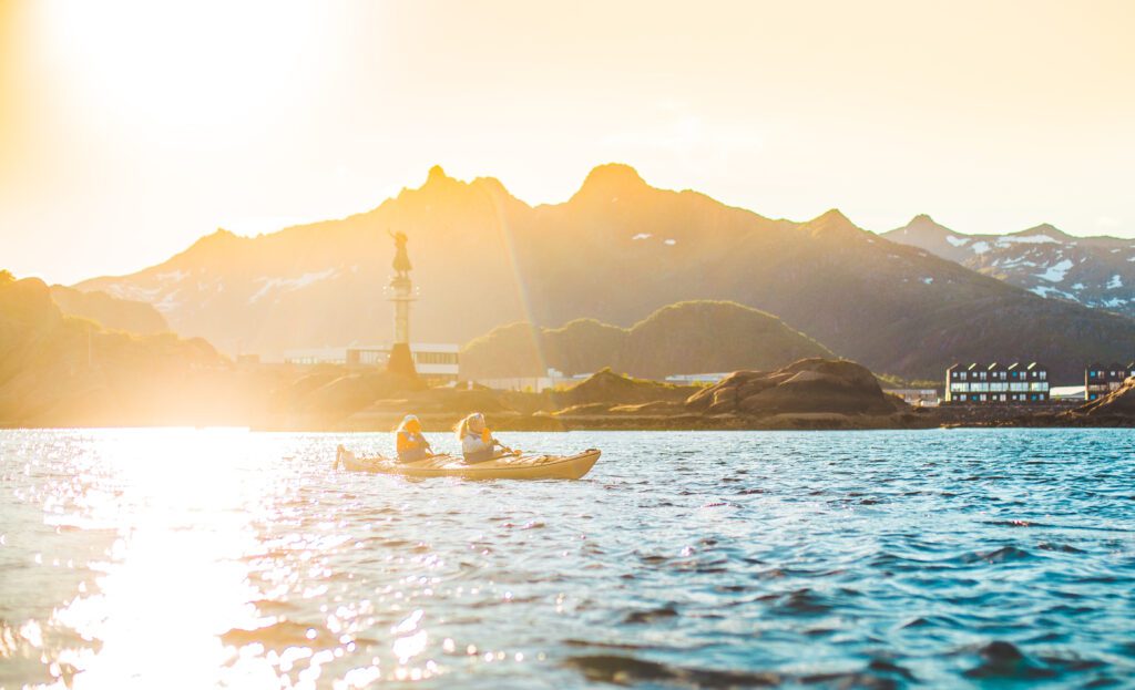 People kayaking in Summer, Lofoten Midnight Sun