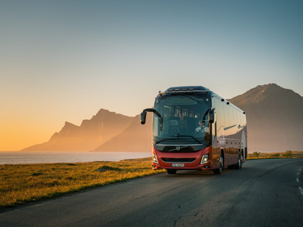 red bus in the sunset