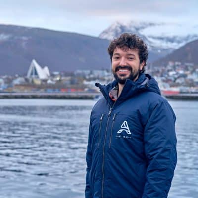 Portrait of a man, Joan, with Tromsø city blurred in the background