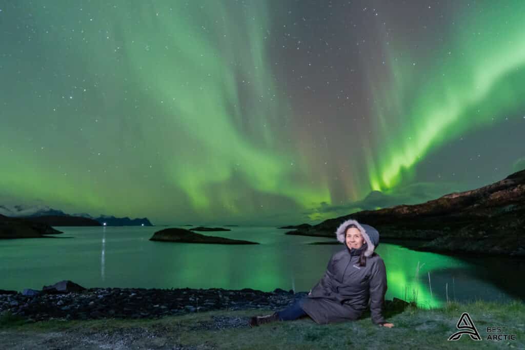 A photo of a guest under the northern lights during a tour with Best Arctic in Tromso