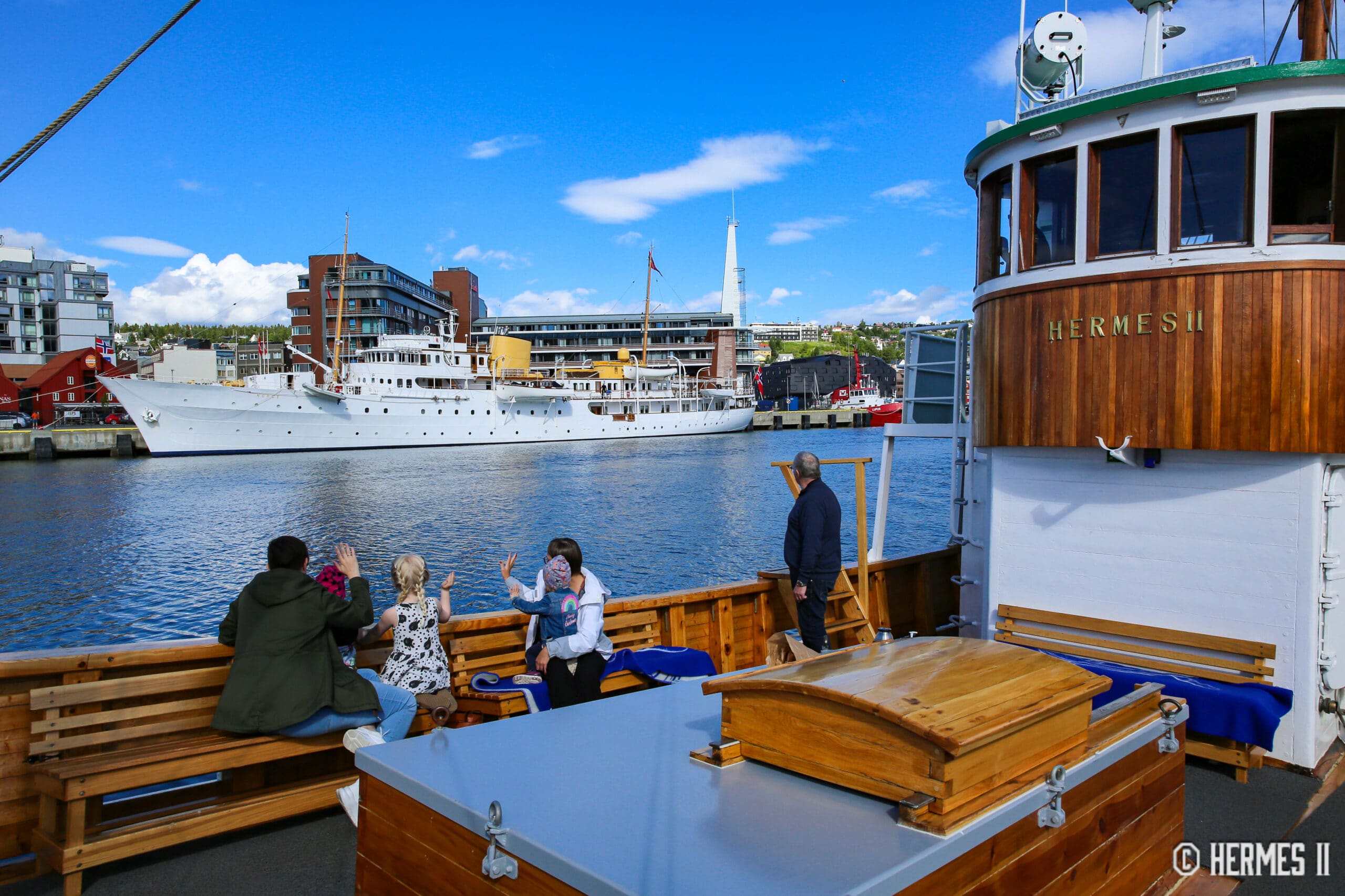 Guests enjoying a boat tour during summer